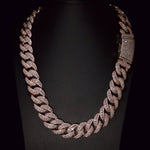 ICED London diamond Cuban-link necklace with pavé diamonds on a black display.