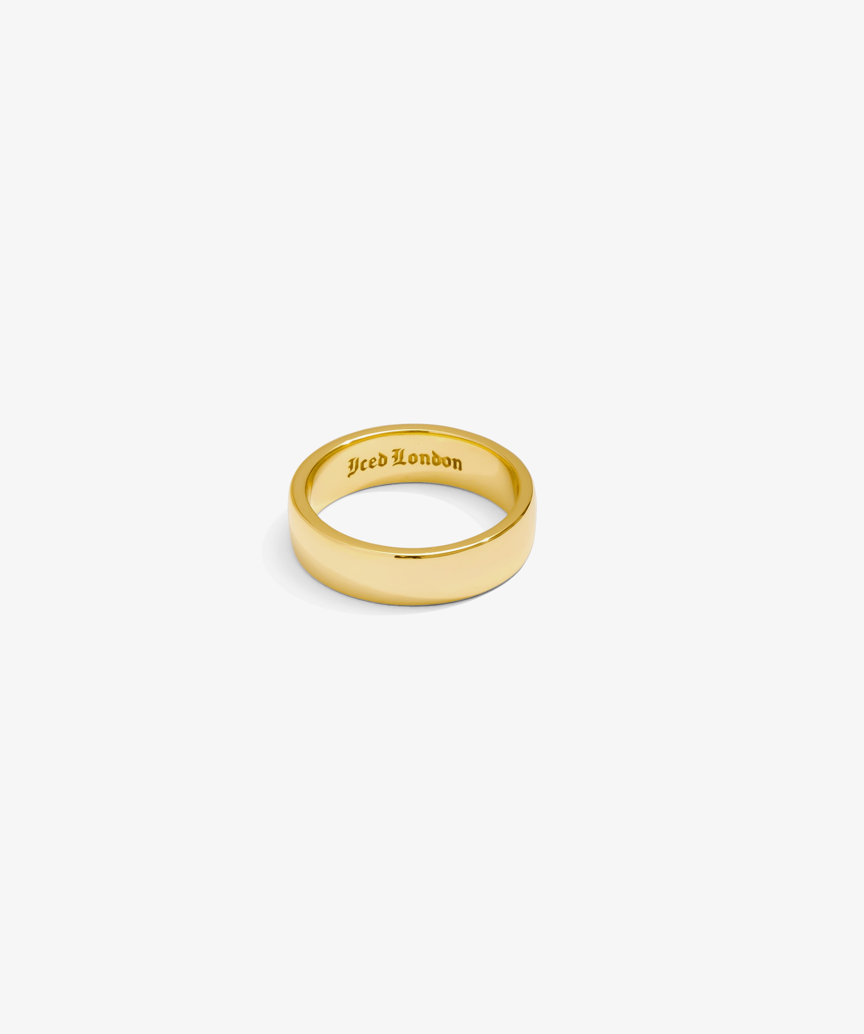 ICED London gold ring with a polished band and inner engraving reading “Iced London.”