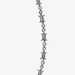 ICED London silver barbed-wire style chain necklace, close-up of twisted wire links.