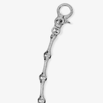 ICED London diamond-studded silver keyring with circular loop and linked chain, close-up jewelry detail.