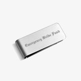 ICED London brushed-silver metal card with engraved text: “Emergency Bribe Fund.”