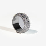 The Inverted Diamond Band in white metal — close-up of the setting
