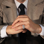 The Inverted Diamond Band worn on the little finger with tailored outerwear