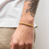6 mm Cubaanse schakelarmband (geelgoud)